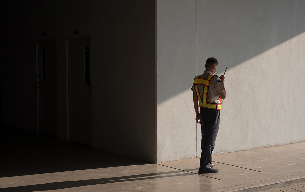 Asian security guard in safety vest