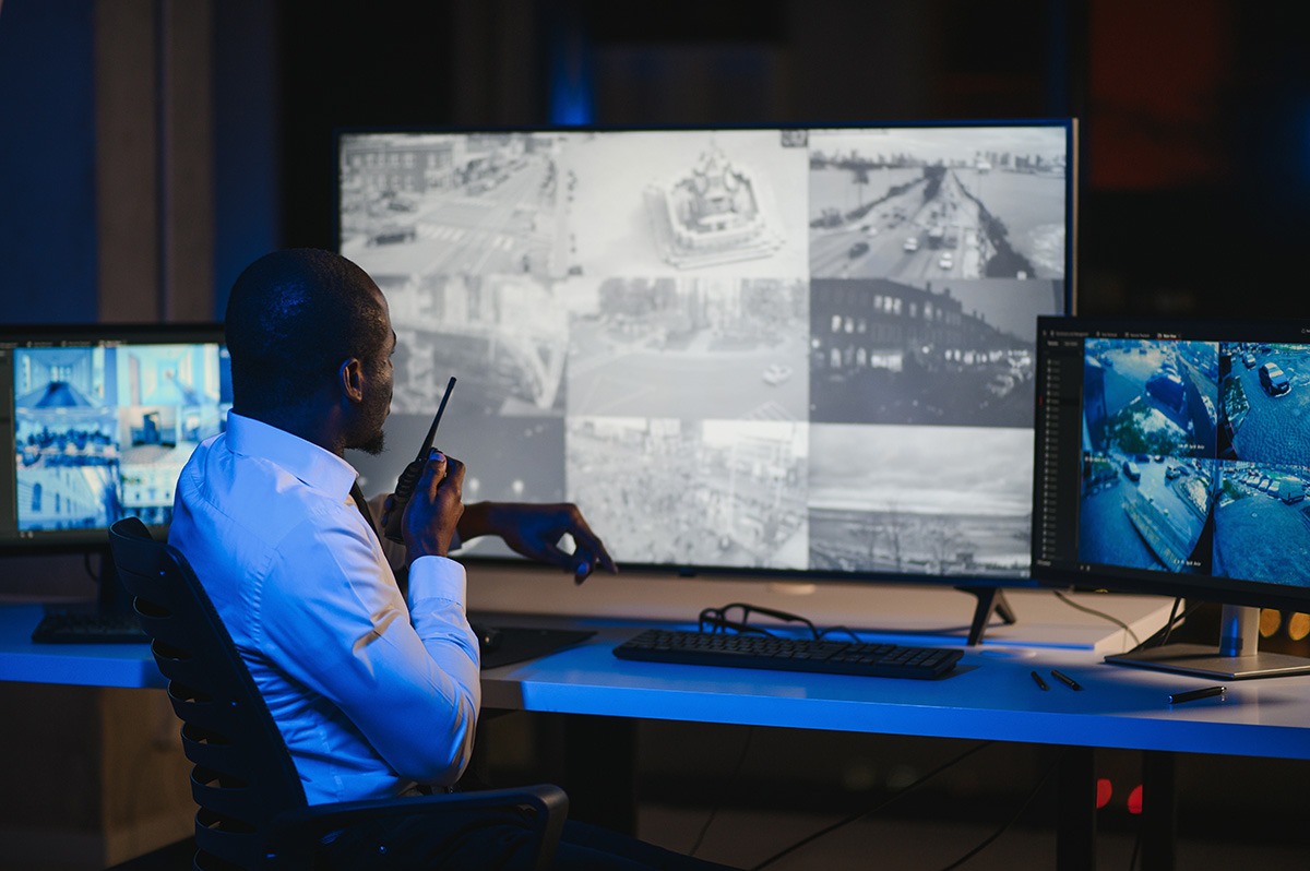 Back view of African American security operator