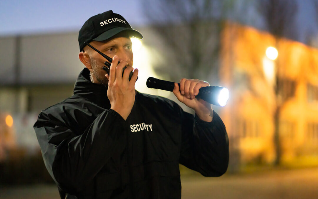Guard Walking With Flashlight
